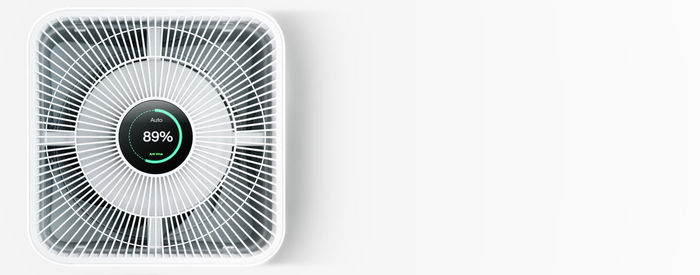 Close-up of electric fan against white background