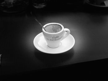 High angle view of coffee cup on table