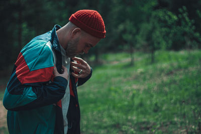 Side view of man looking away