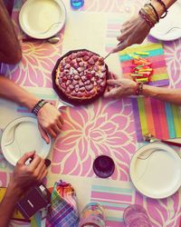 Cropped image of woman holding coffee cup