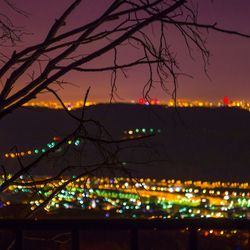 Illuminated cityscape at night