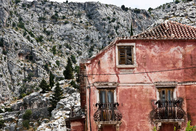 Old house against mountain