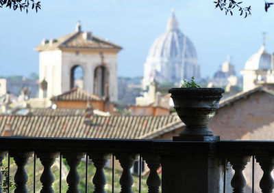 Panorama of rome, domes and roofs. in the center, the dome of st. peter's basilica.