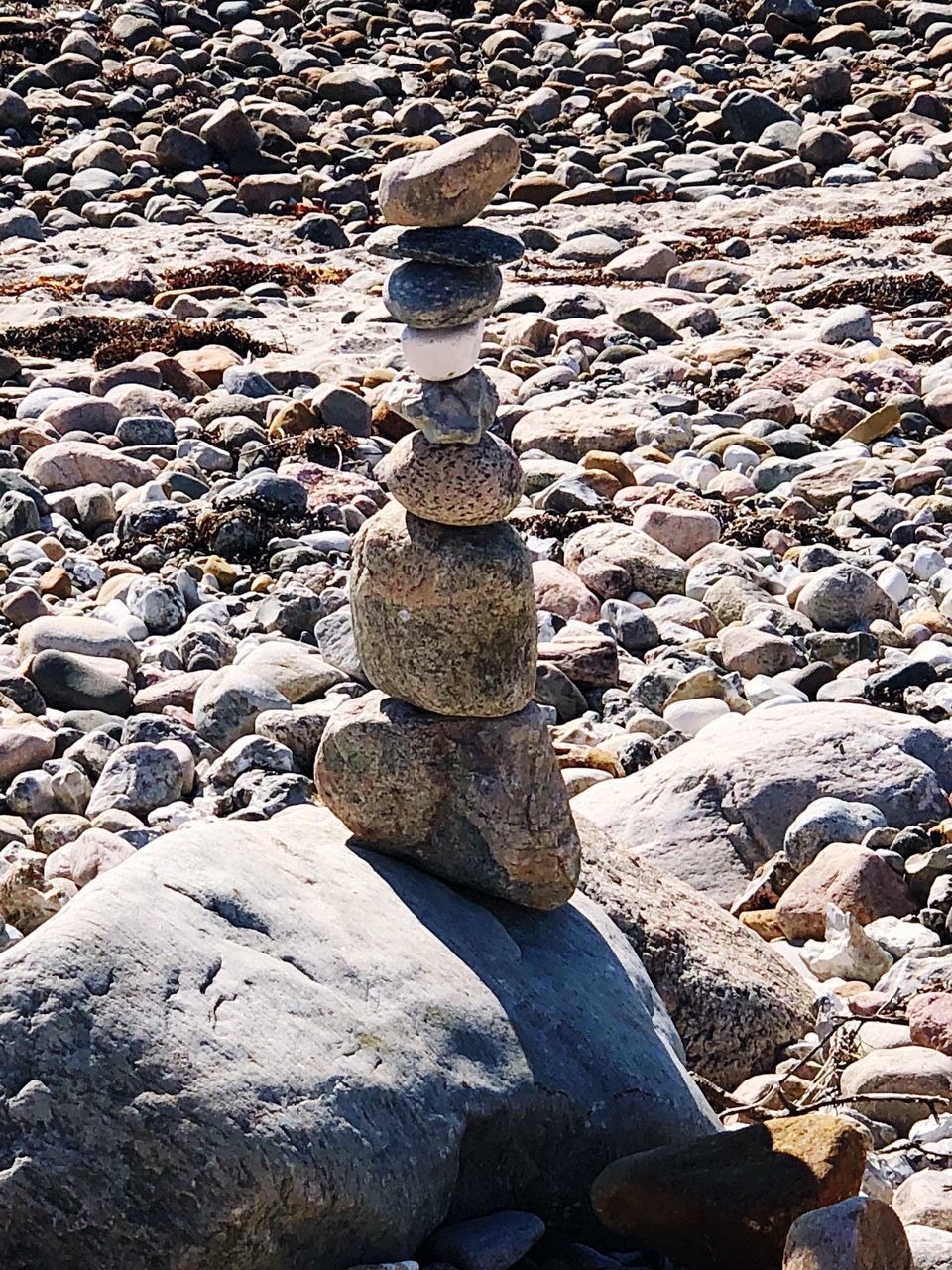 STACK OF STONES ON BEACH