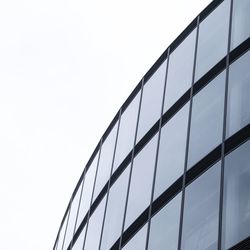 Low angle view of modern building against clear sky