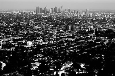 Aerial view of cityscape against sky