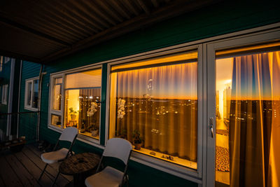 Interior of illuminated building at night