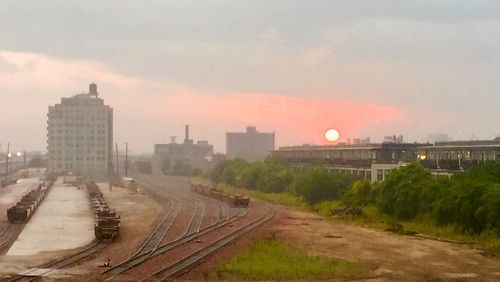 Road against cloudy sky at sunset