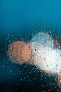 Wet glass window during rainy season