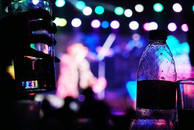 Close-up of wine glass bottles