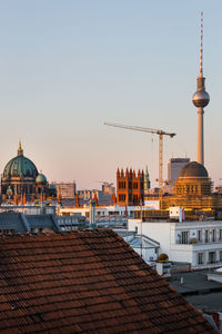 View of buildings in city against sky