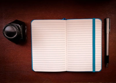 Directly above shot of open book on table