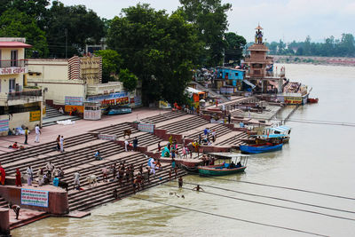 High angle view of city by river