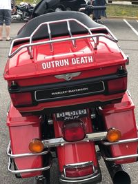 Close-up of red vintage car on street