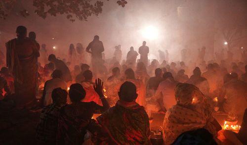 People are standing inside croud in rakher upobash at barodi lokhnath brahmachari ashram