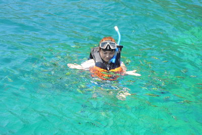 Woman snorkeling in sea