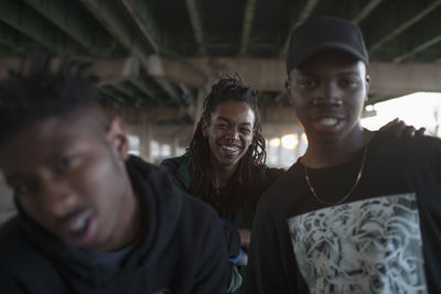 Portrait of smiling young man at music concert