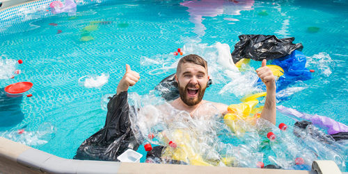 Young man in swimming pool