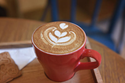 Close-up of cappuccino on table