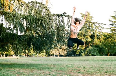 Man jumping in field