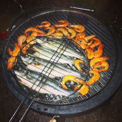 High angle view of food on barbecue grill