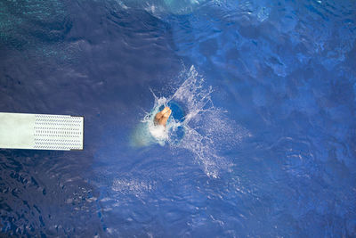 Women in swimming in pool