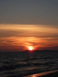 Scenic view of sea against sky during sunset