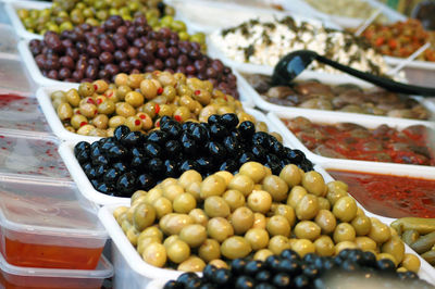 Fruits in container at market stall