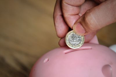 Close-up of hand holding ring