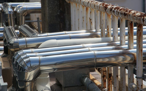 Metal pipes for air conditioning on rooftops of buildings