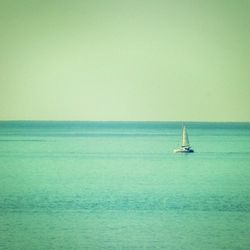 Boat sailing in sea