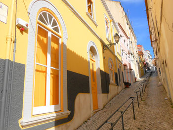 Alley amidst buildings in town