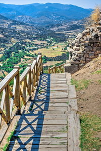 Scenic view of residential district against mountain