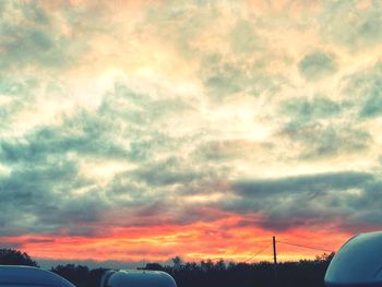 Low angle view of dramatic sky during sunset