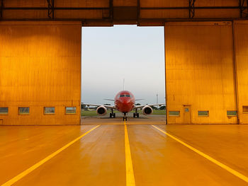 Aviation, aircraft maintenance, engering hangar, doors opening.