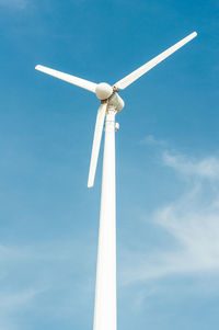 Low angle view of wind turbine against sky