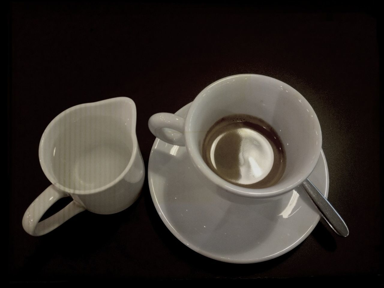 indoors, coffee cup, still life, drink, table, saucer, coffee - drink, cup, food and drink, refreshment, coffee, spoon, studio shot, close-up, high angle view, white color, directly above, tea cup, freshness, beverage