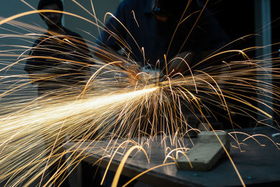 Close-up of sparks in factory