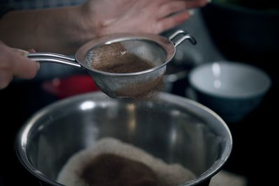 Close-up of person preparing food