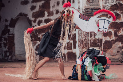 Woman dancing in traditional clothing