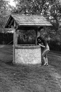 Full length of woman standing on field