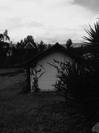 House on field against sky