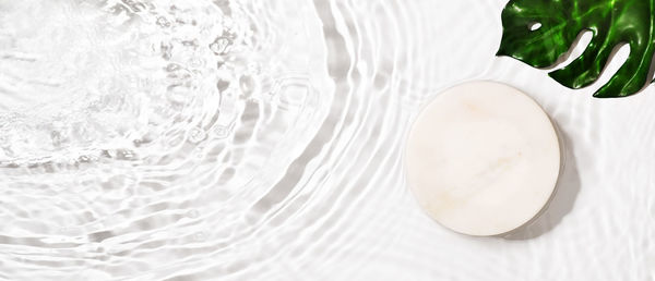 High angle view of white water on table