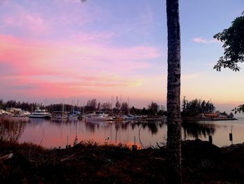 Scenic view of lake against sky during sunset