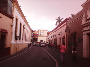 People walking on city street