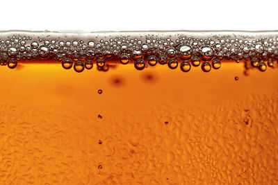 Close-up of drink against white background