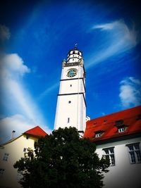 Low angle view of church against blue sky