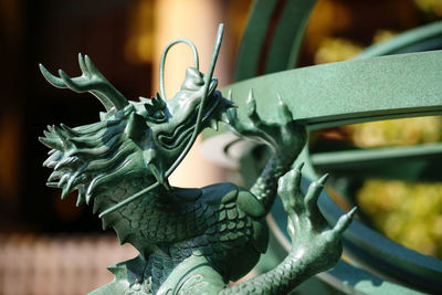 Close-up of statue of dragon