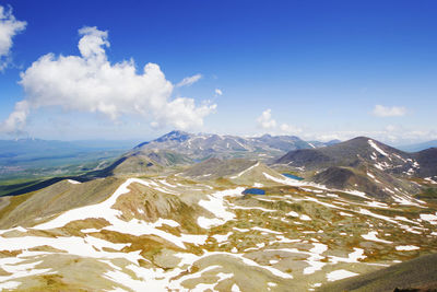 Mountain range landscape, snow and hill, daylight and sunshine