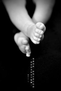 Close-up of hand holding baby